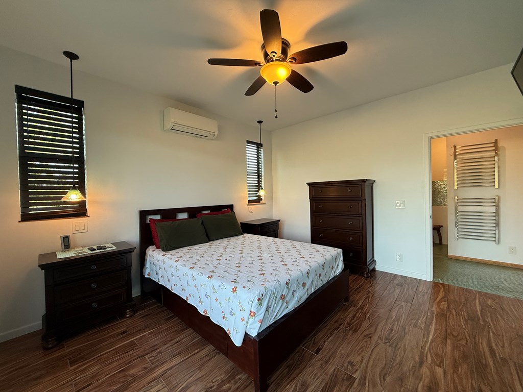 150 Dowling Road West Ingram, TX 78025 - Photo 17 of 33 a bedroom with a bed and a window