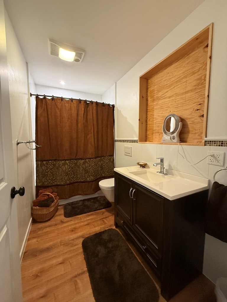 150 Dowling Road West Ingram, TX 78025 - Photo 25 of 33 a bathroom with a sink and a mirror