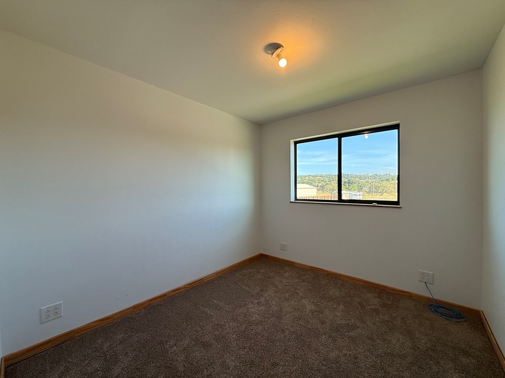 150 Dowling Road West Ingram, TX 78025 - Photo 26 of 33 an empty room with windows