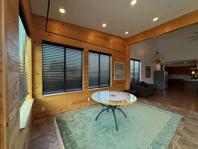 a view of a hallway with stairs