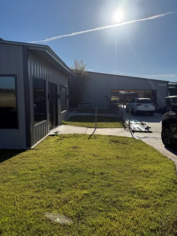 a view of a swimming pool with an outdoor space