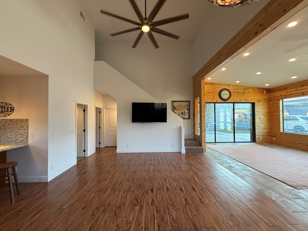 150 Dowling Road West Ingram, TX 78025 - Photo 9 of 33 wooden floor in an empty room with a window