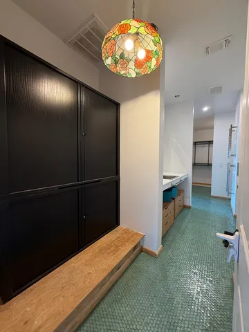 a view of a living room and hardwood floor