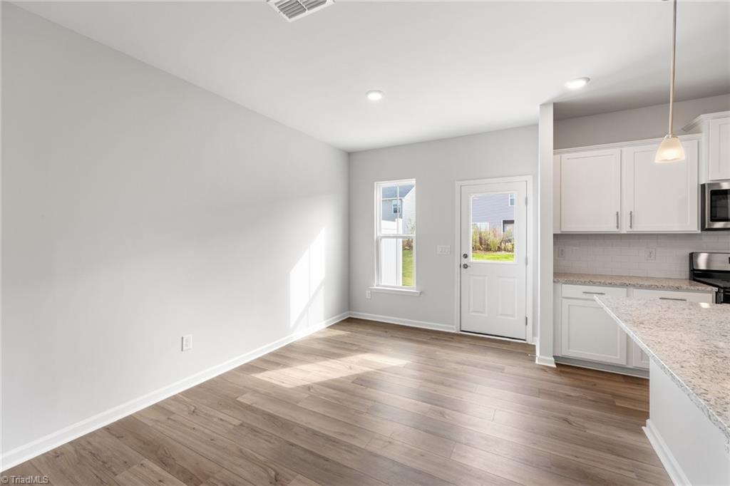 1006 Poets Walk Road Whitsett, NC 27377 - Photo 10 of 23