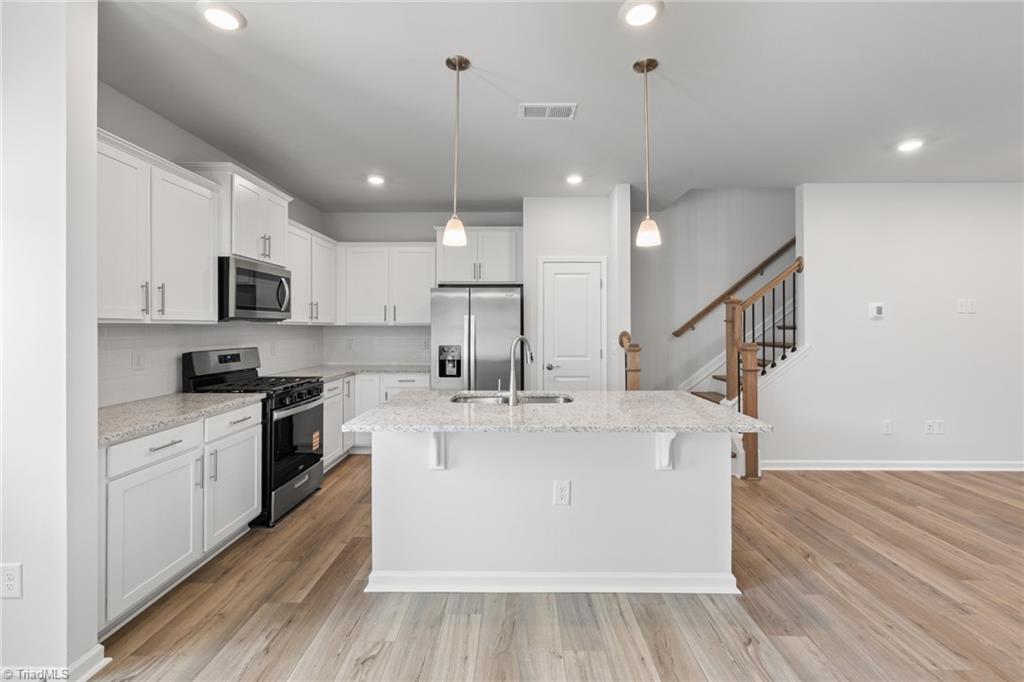 1006 Poets Walk Road Whitsett, NC 27377 - Photo 5 of 23