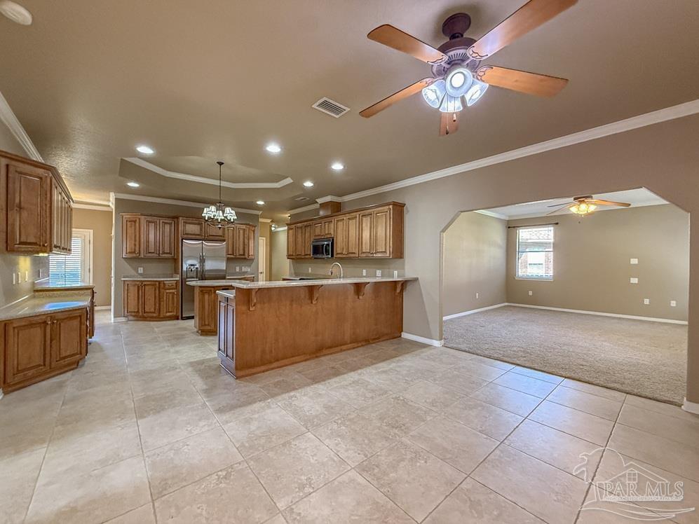 3554 Haley Way Pace, FL 32571 - Photo 13 of 40 a view of kitchen with refrigerator and cabinets
