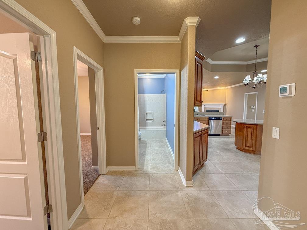 3554 Haley Way Pace, FL 32571 - Photo 27 of 40 a view of a hallway with furniture and a window