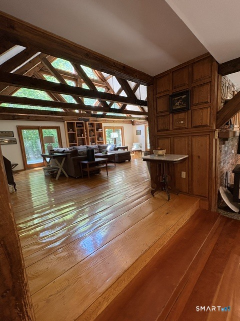 40 Looking Glass Hill Road Litchfield, CT 06750 - Photo 10 of 33 a room with wooden floor and furniture