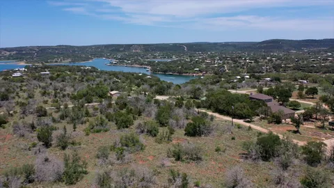 a view of a city with mountains in the background