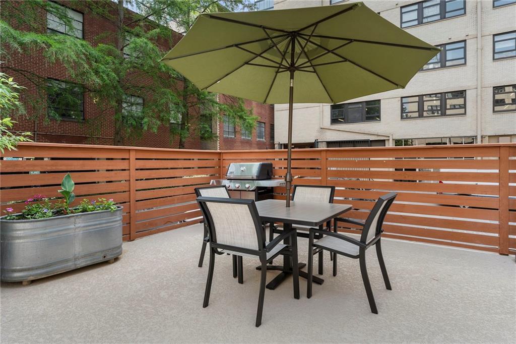 878 Peachtree Street Northeast, Unit 601 Atlanta, GA 30309 - Photo 36 of 43 a view of an outdoor space with furniture