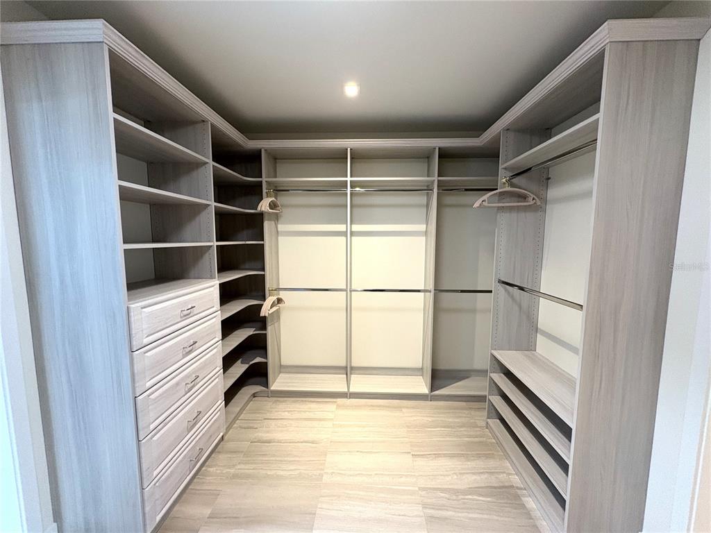 3101 Bayshore Boulevard, Unit 2004 Tampa, FL 33629 - Photo 25 of 64 a view of walk in closet with empty racks