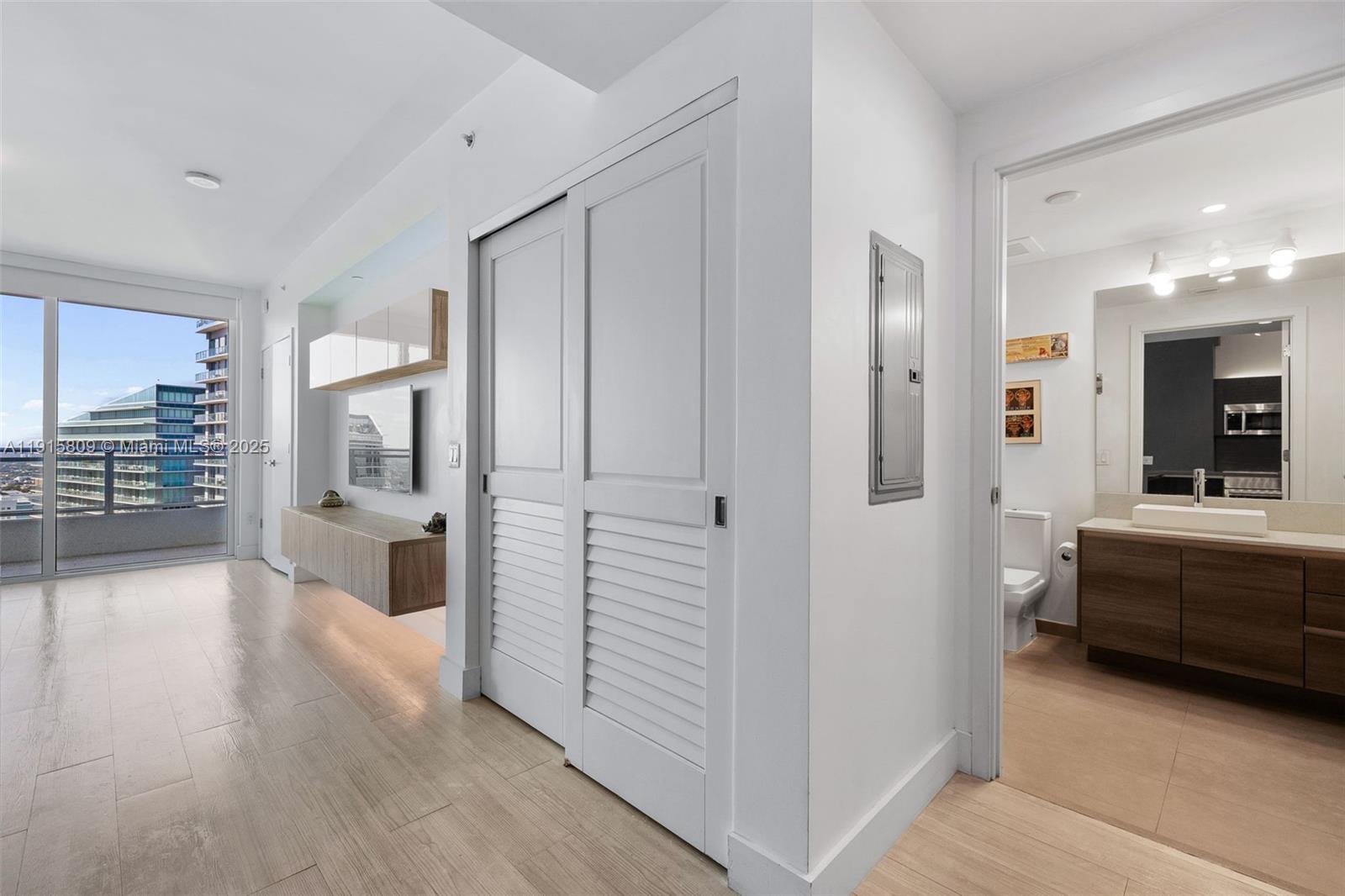 1080 Brickell Avenue, Unit 3705 Miami, FL 33131 - Photo 19 of 32 a bathroom with a tub and shower