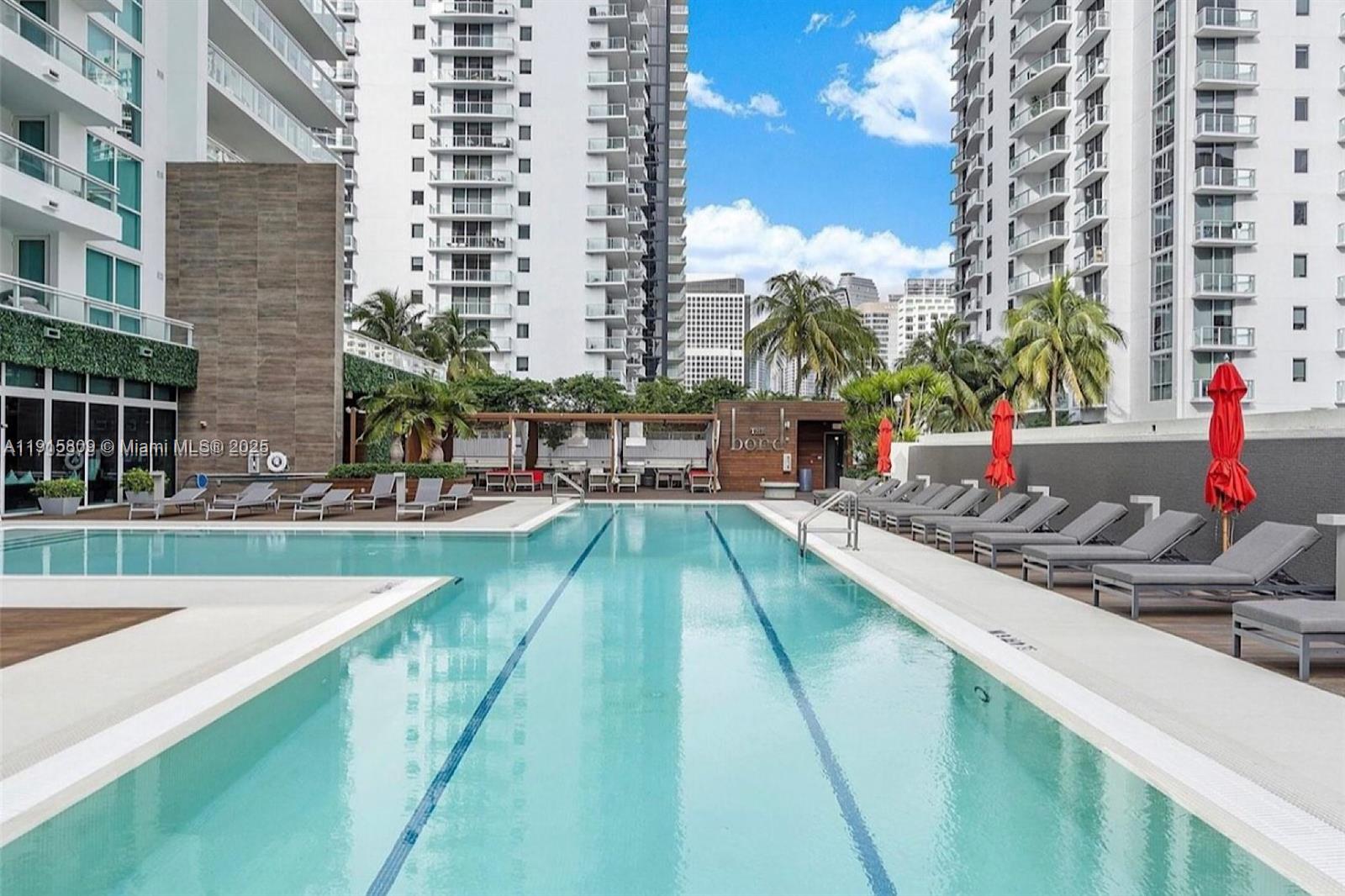 1080 Brickell Avenue, Unit 3705 Miami, FL 33131 - Photo 25 of 32 a view of swimming pool from a balcony