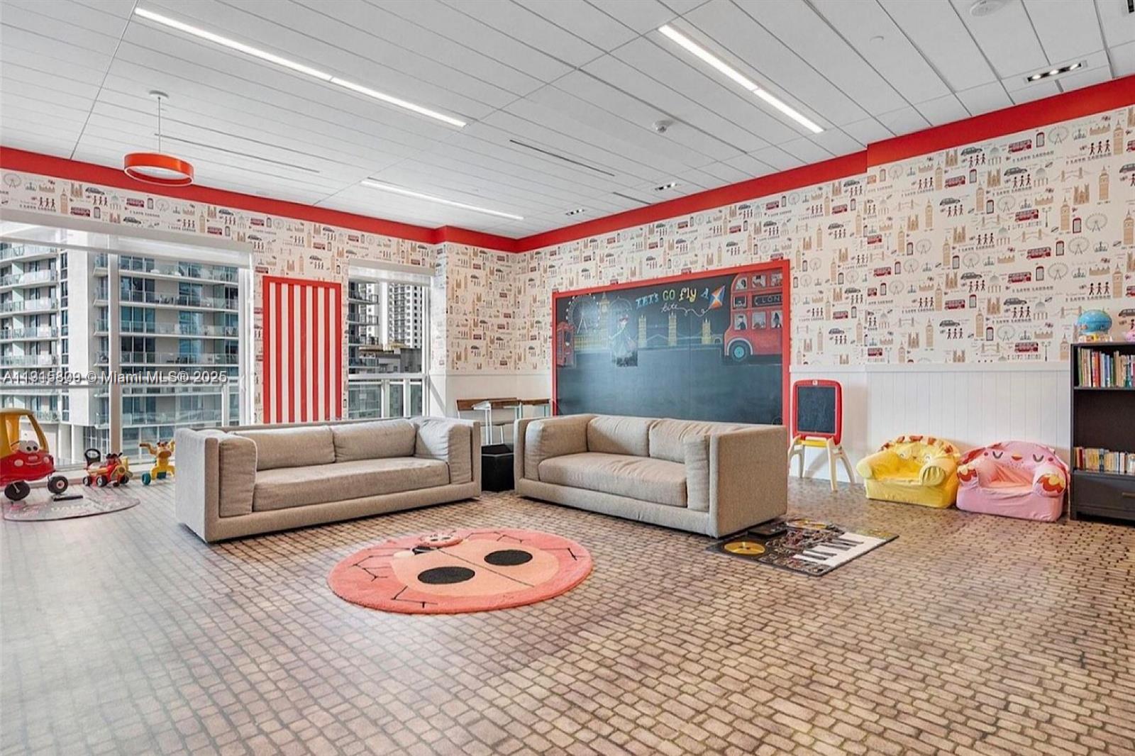 1080 Brickell Avenue, Unit 3705 Miami, FL 33131 - Photo 29 of 32 a living room with furniture and a potted plant