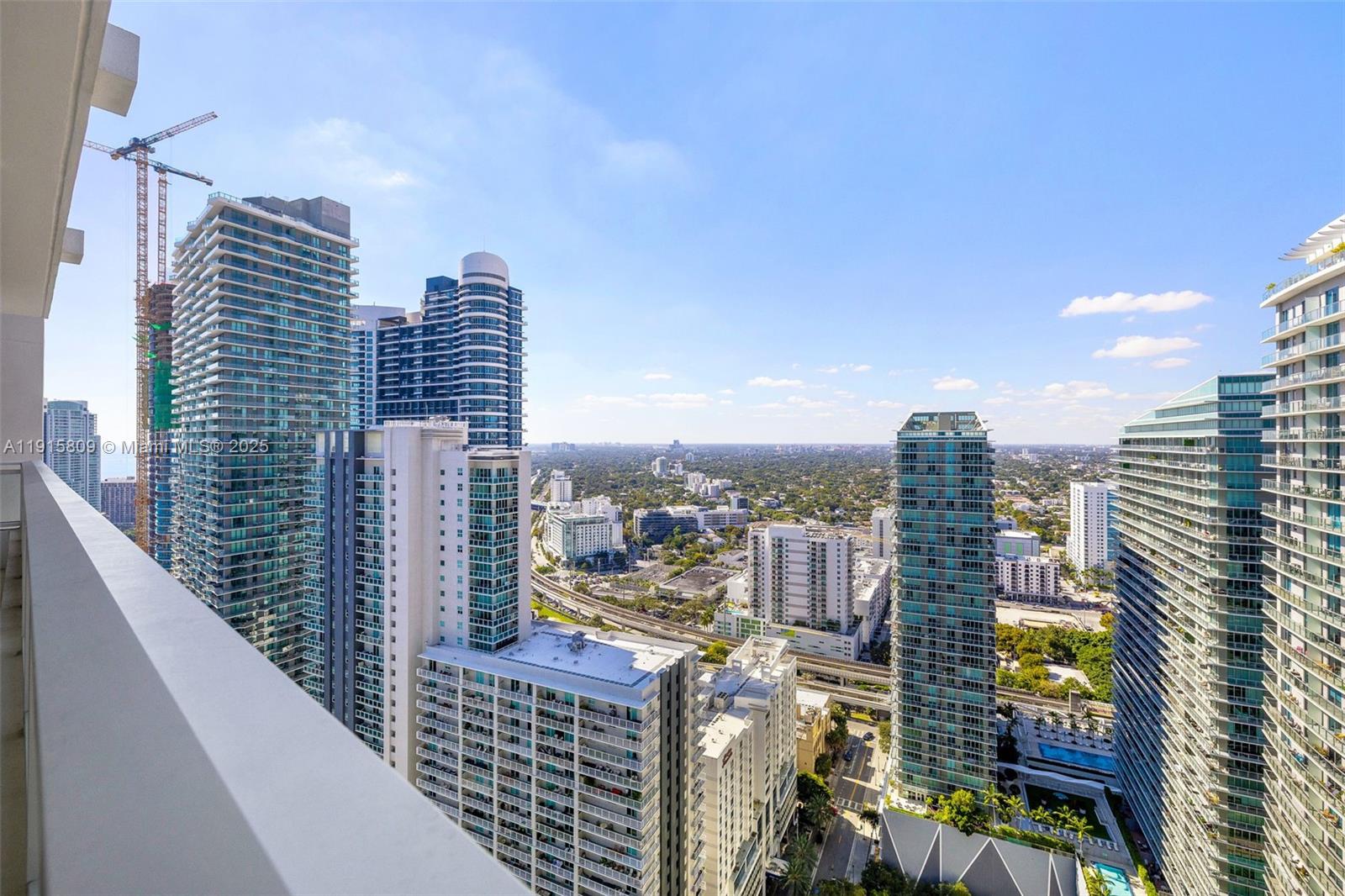 1080 Brickell Avenue, Unit 3705 Miami, FL 33131 - Photo 4 of 32 a city view with tall buildings