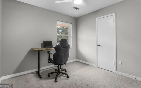 a view of a storage & utility room with a sink