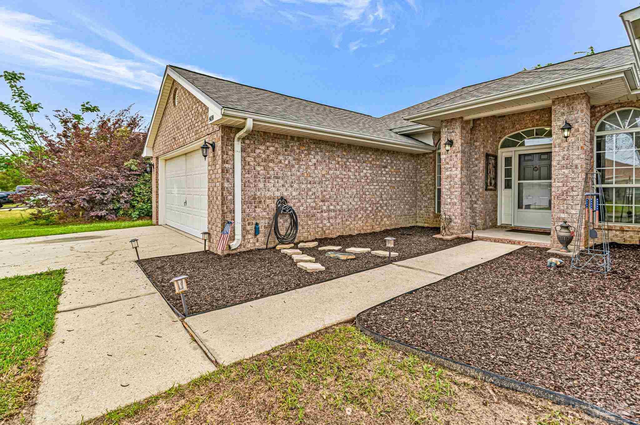 5691 Berrybrook Circle Pace, FL 32571 - Photo 2 of 22 front view of a house