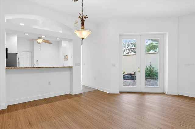 a view of a kitchen with a dishwasher and a window