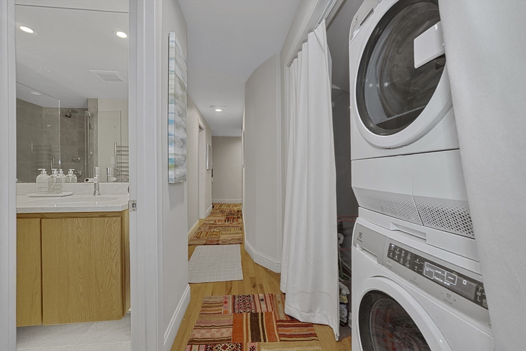 70 Clarendon Street, Unit 1 Boston, MA 02116 - Photo 12 of 19 a utility room with dryer and washer