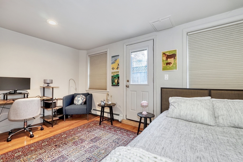 70 Clarendon Street, Unit 1 Boston, MA 02116 - Photo 15 of 19 a bedroom with furniture and a rug