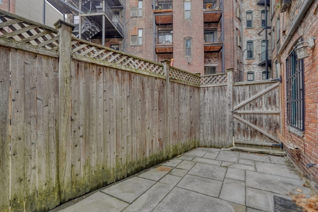 70 Clarendon Street, Unit 1 Boston, MA 02116 - Photo 16 of 19 a view of entryway with a wooden door