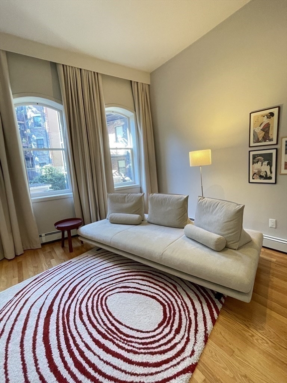 70 Clarendon Street, Unit 1 Boston, MA 02116 - Photo 10 of 19 a bedroom with bed and a window