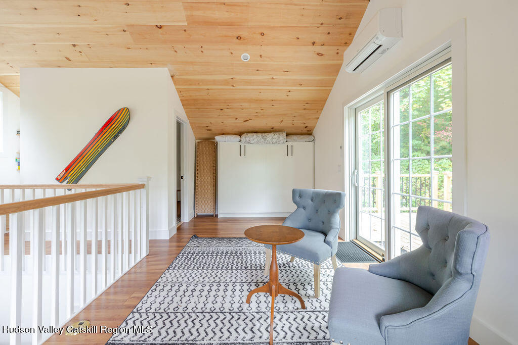 25 Catamount Road Hillsdale, NY 12529 - Photo 21 of 26 a living room with furniture and a table