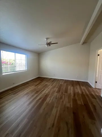 a view of an empty room and window