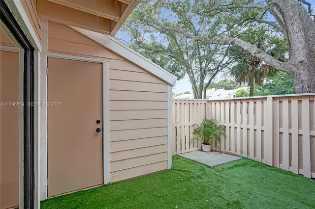 a view of a backyard with a garden
