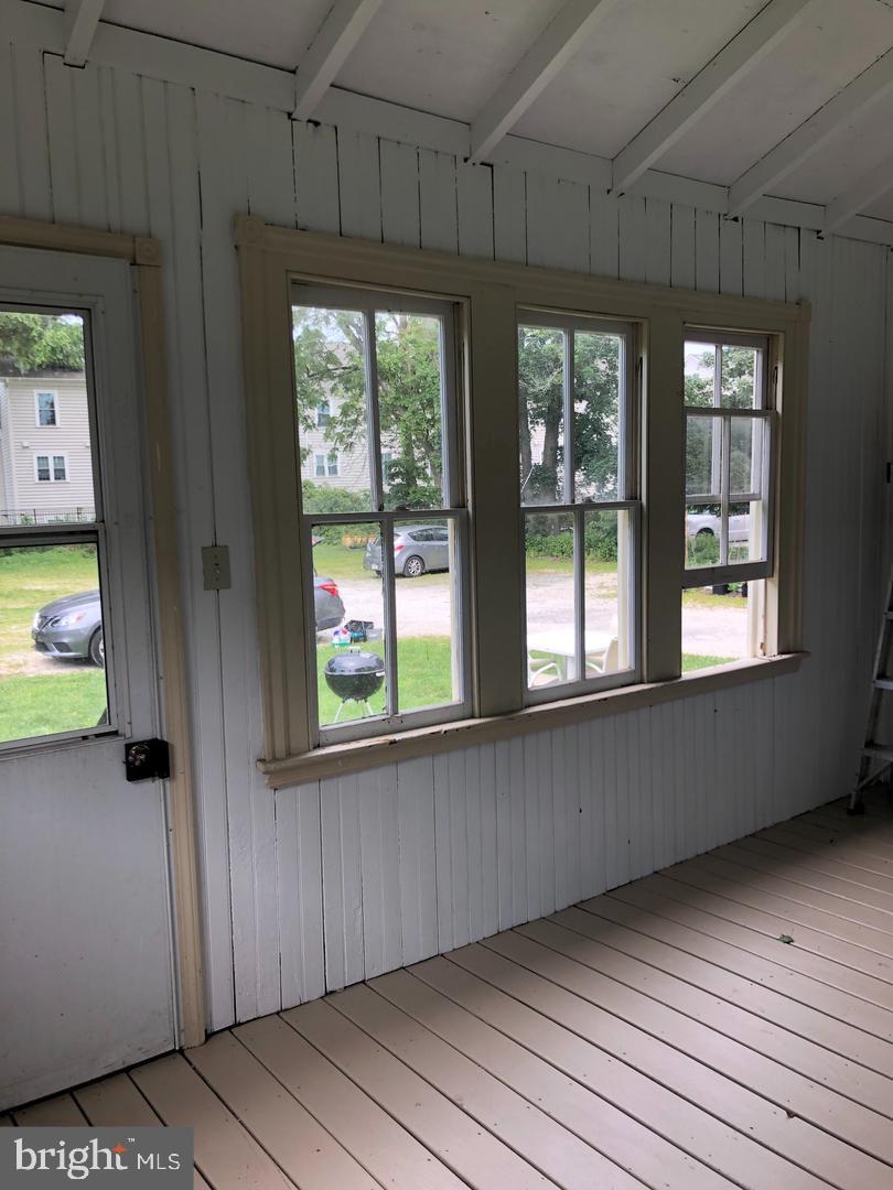 58 Darby Road, Unit 1 Paoli, PA 19301 - Photo 11 of 16 a view of an empty room with a window