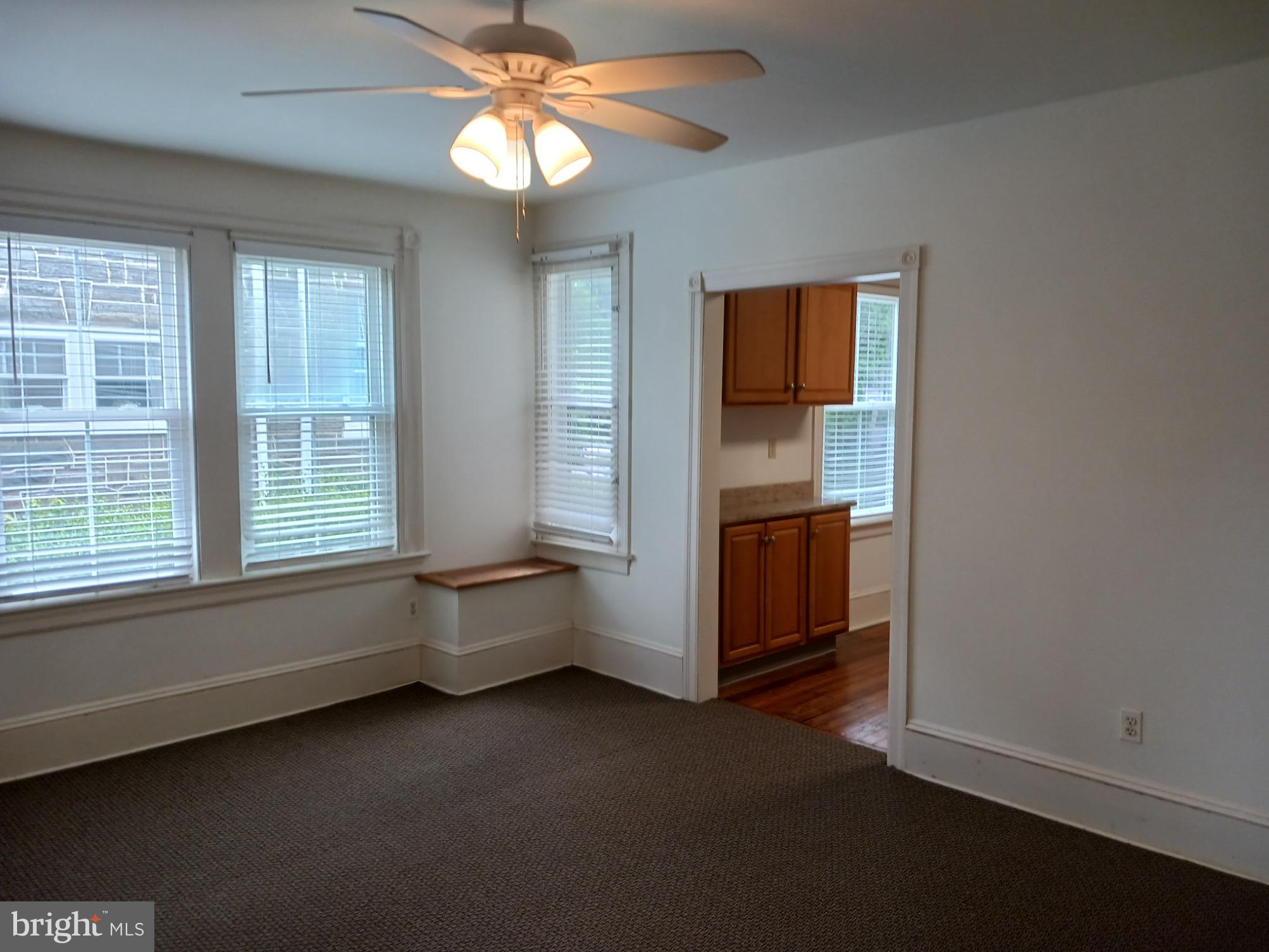58 Darby Road, Unit 1 Paoli, PA 19301 - Photo 5 of 16 a room with window and ceiling fan