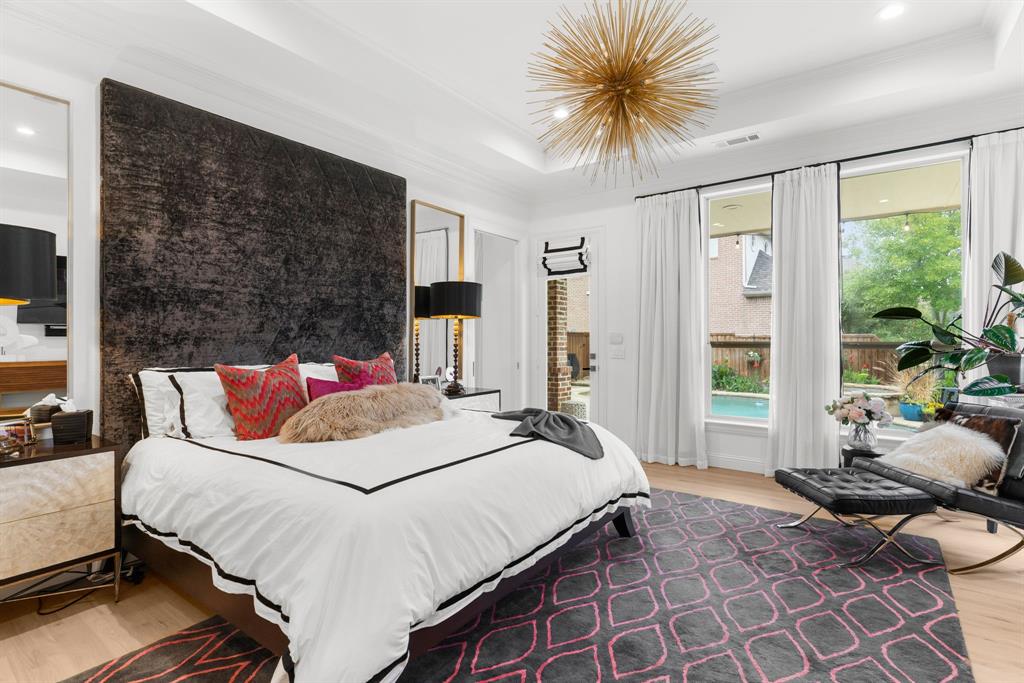 1307 Silverlake Road McKinney, TX 75072 - Photo 15 of 33 a bedroom with a large bed and a window