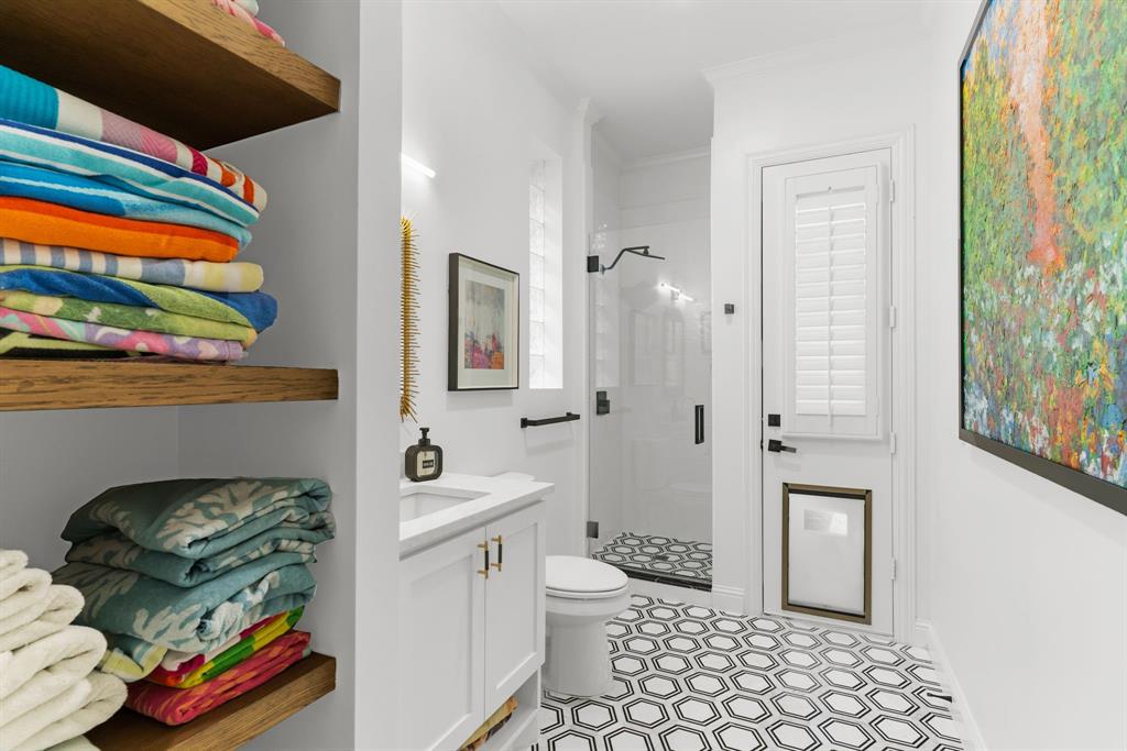 1307 Silverlake Road McKinney, TX 75072 - Photo 21 of 33 a bathroom with a sink toilet and shower