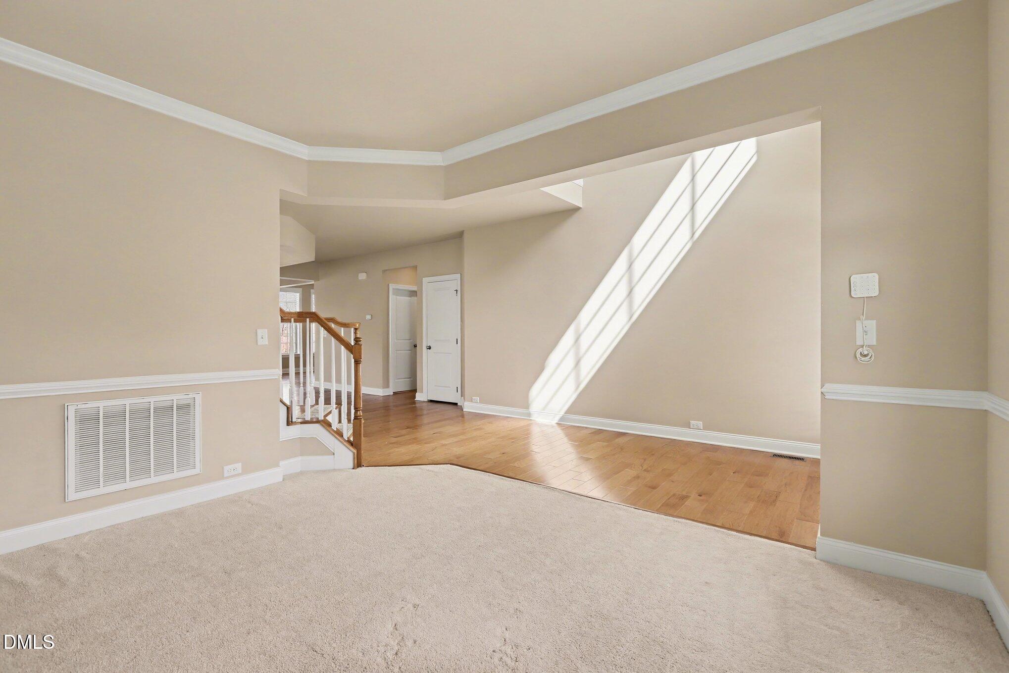 351 Gartrell Way Cary, NC 27519 - Photo 9 of 51 a view of entryway and hall with a front door