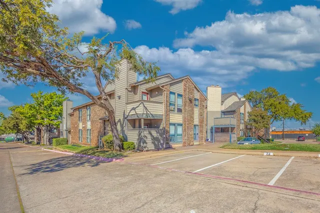 a view of a building with a street