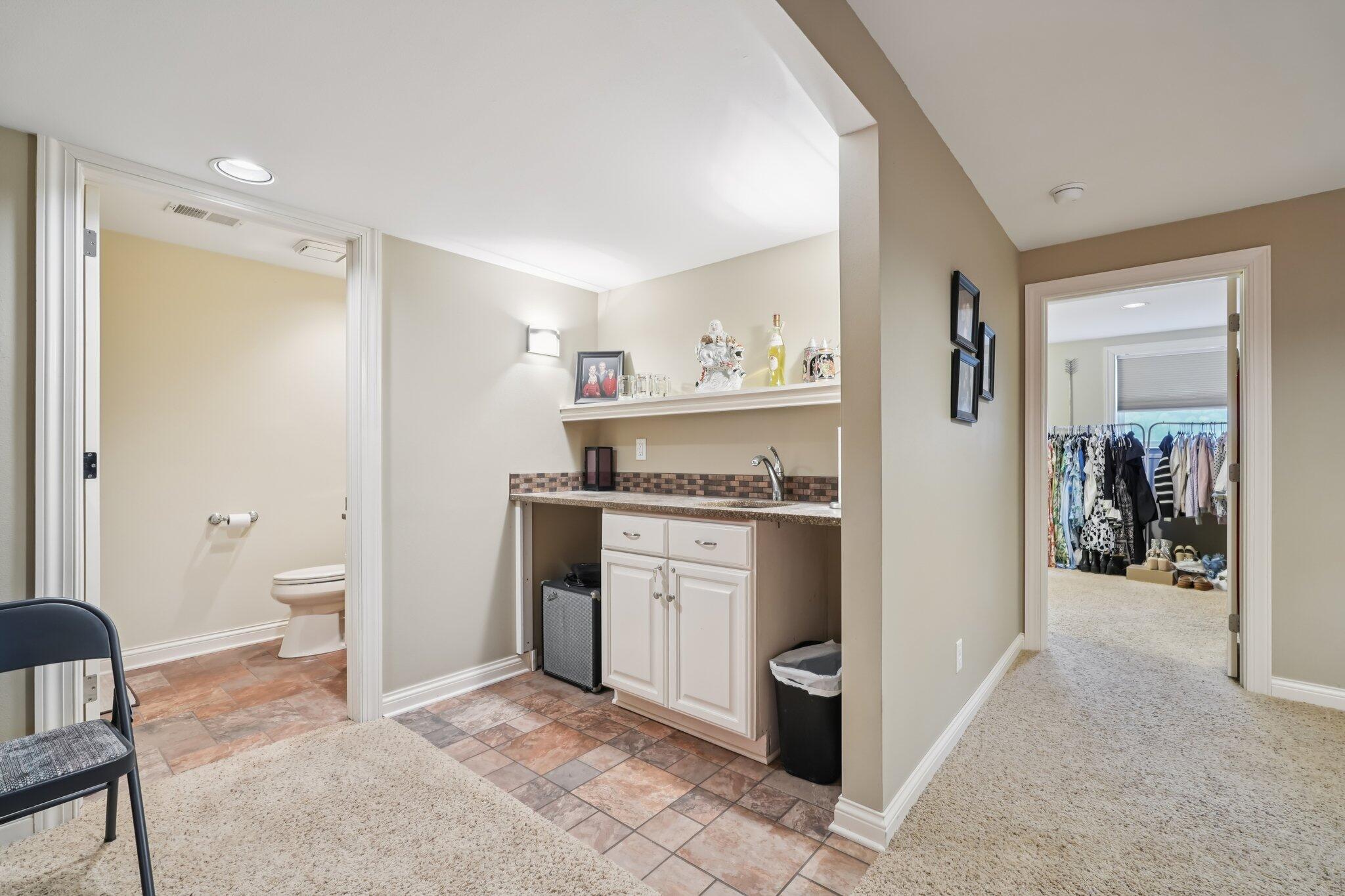 885 Rocky Point, Unit C Brookfield, WI 53005 - Photo 23 of 38 Full Bath and Wet Bar - Lower Level