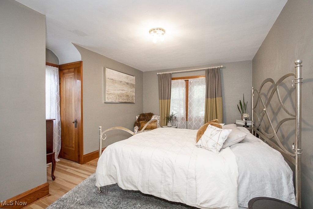 7070 Ridge Road Parma, OH 44129 - Photo 13 of 28 Bedroom featuring light hardwood / wood-style floors