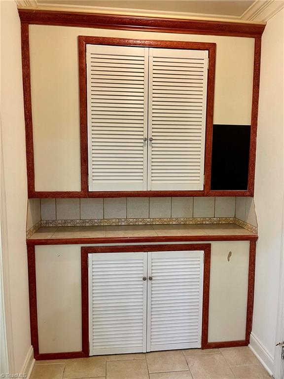 7798 Elizabeth Drive Oak Ridge, NC 27310 - Photo 17 of 26 Butler pantry with extra storage
