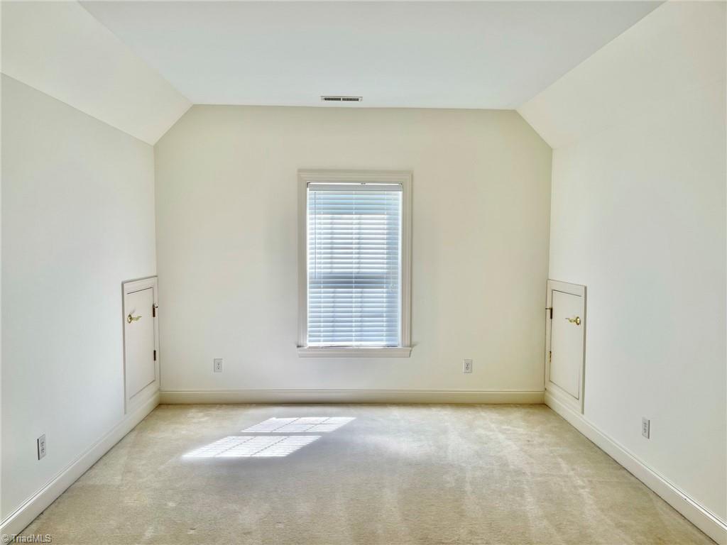 7798 Elizabeth Drive Oak Ridge, NC 27310 - Photo 19 of 26 Separate sitting area off primary bedroom