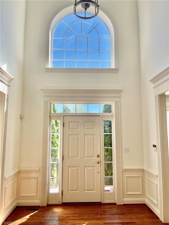 7798 Elizabeth Drive Oak Ridge, NC 27310 - Photo 3 of 26 Bright sunny foyer