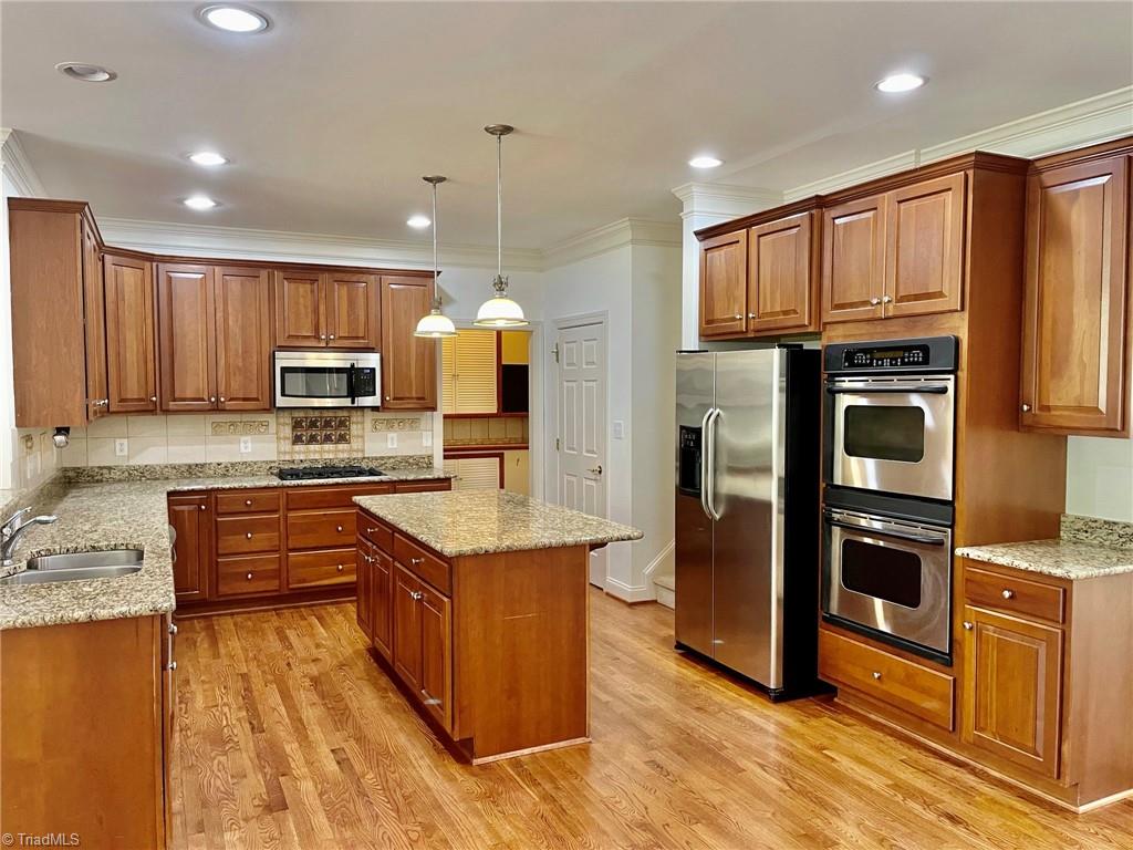 7798 Elizabeth Drive Oak Ridge, NC 27310 - Photo 10 of 26 Beautiful kitchen with tons of cabinets and counter space