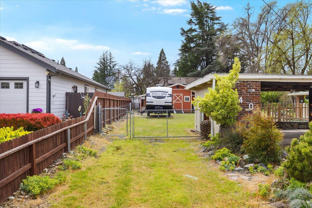 440 Bush Street Central Point, OR 97502 - Photo 33 of 40 a view of a house with a yard