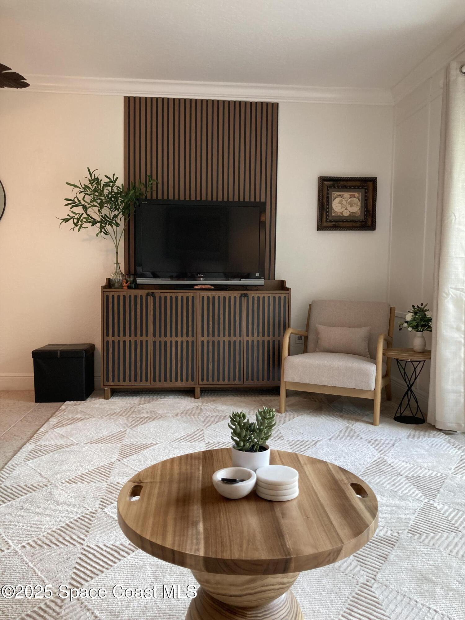 7 Cove Road Melbourne Beach, FL 32951 - Photo 17 of 55 a view of a livingroom with furniture and staircase