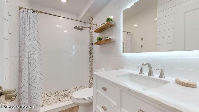 7 Cove Road Melbourne Beach, FL 32951 - Photo 27 of 55 a bathroom with a sink toilet and shower