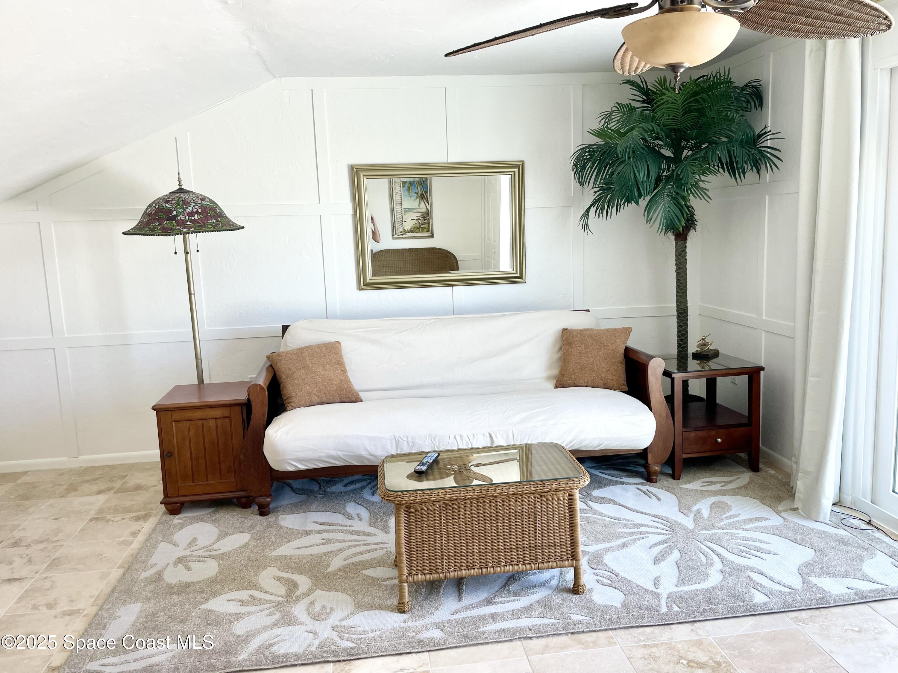 7 Cove Road Melbourne Beach, FL 32951 - Photo 37 of 55 a living room with furniture and a potted plant