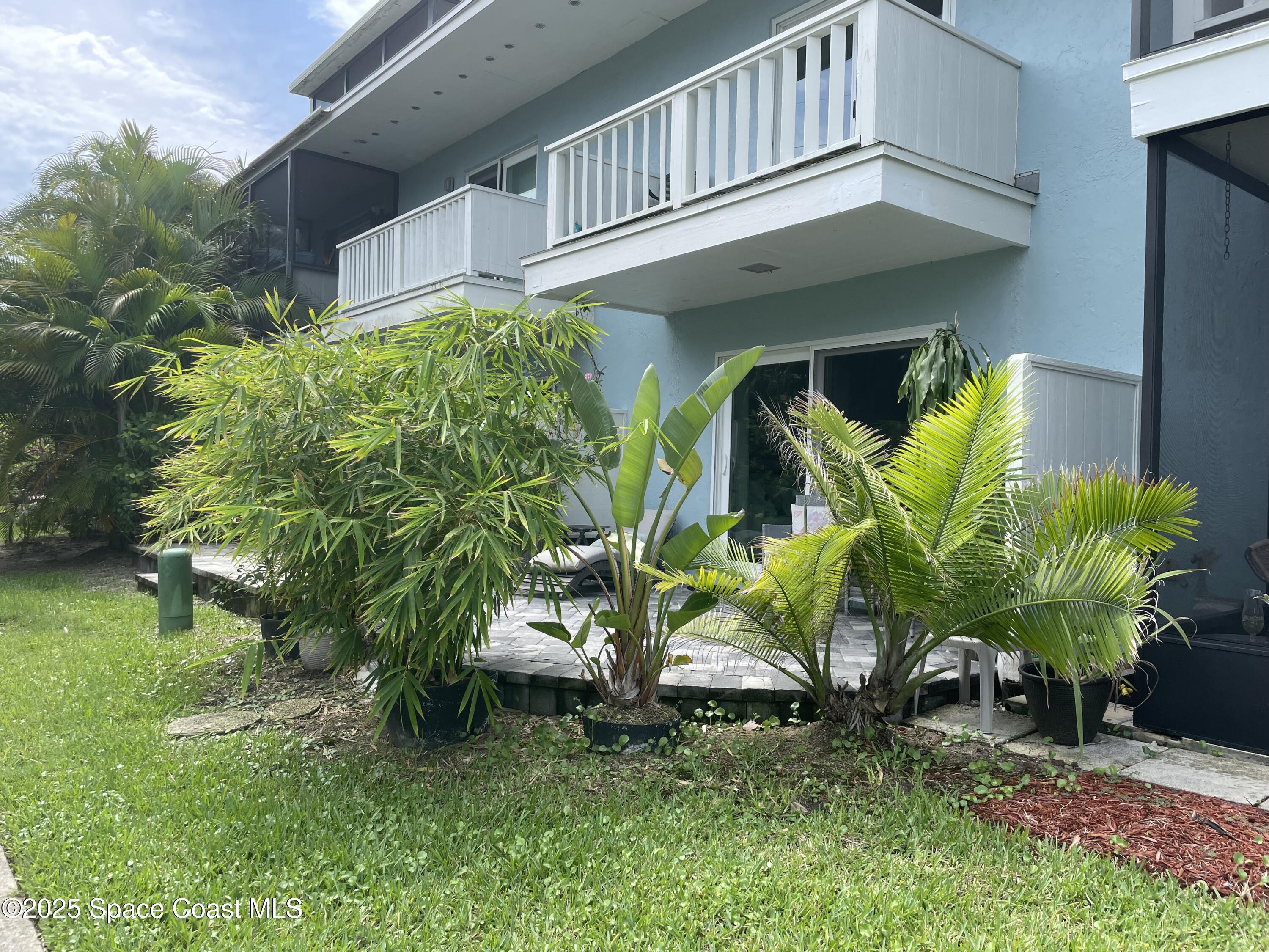 7 Cove Road Melbourne Beach, FL 32951 - Photo 44 of 55 a view of a house with a yard