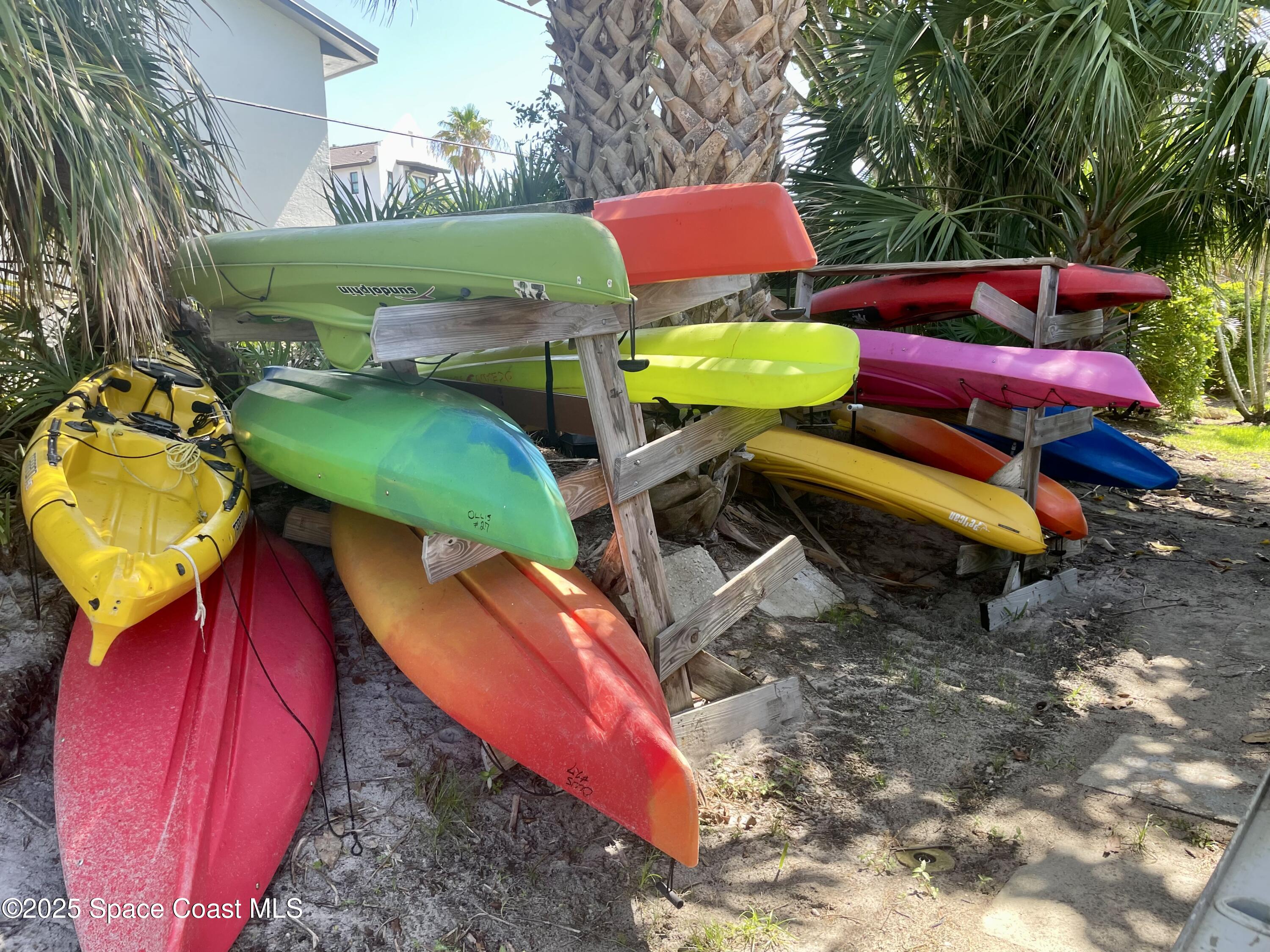 7 Cove Road Melbourne Beach, FL 32951 - Photo 49 of 55 a view of a yard with furniture and outdoor seating