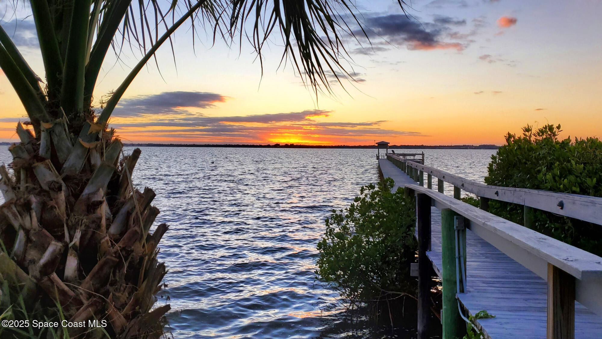 7 Cove Road Melbourne Beach, FL 32951 - Photo 53 of 55 a balcony with an outdoor space