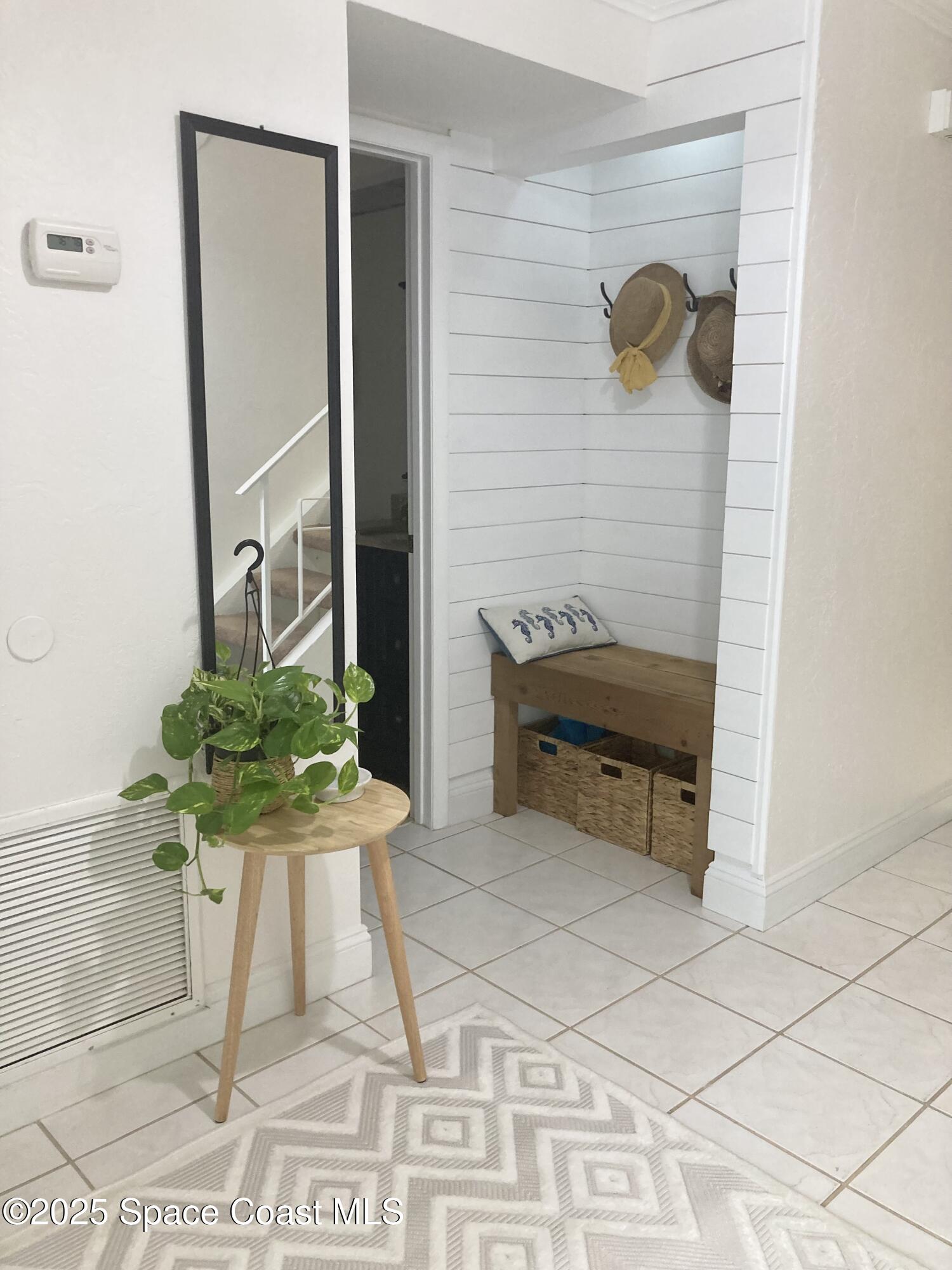 7 Cove Road Melbourne Beach, FL 32951 - Photo 6 of 55 a view of entryway with livingroom