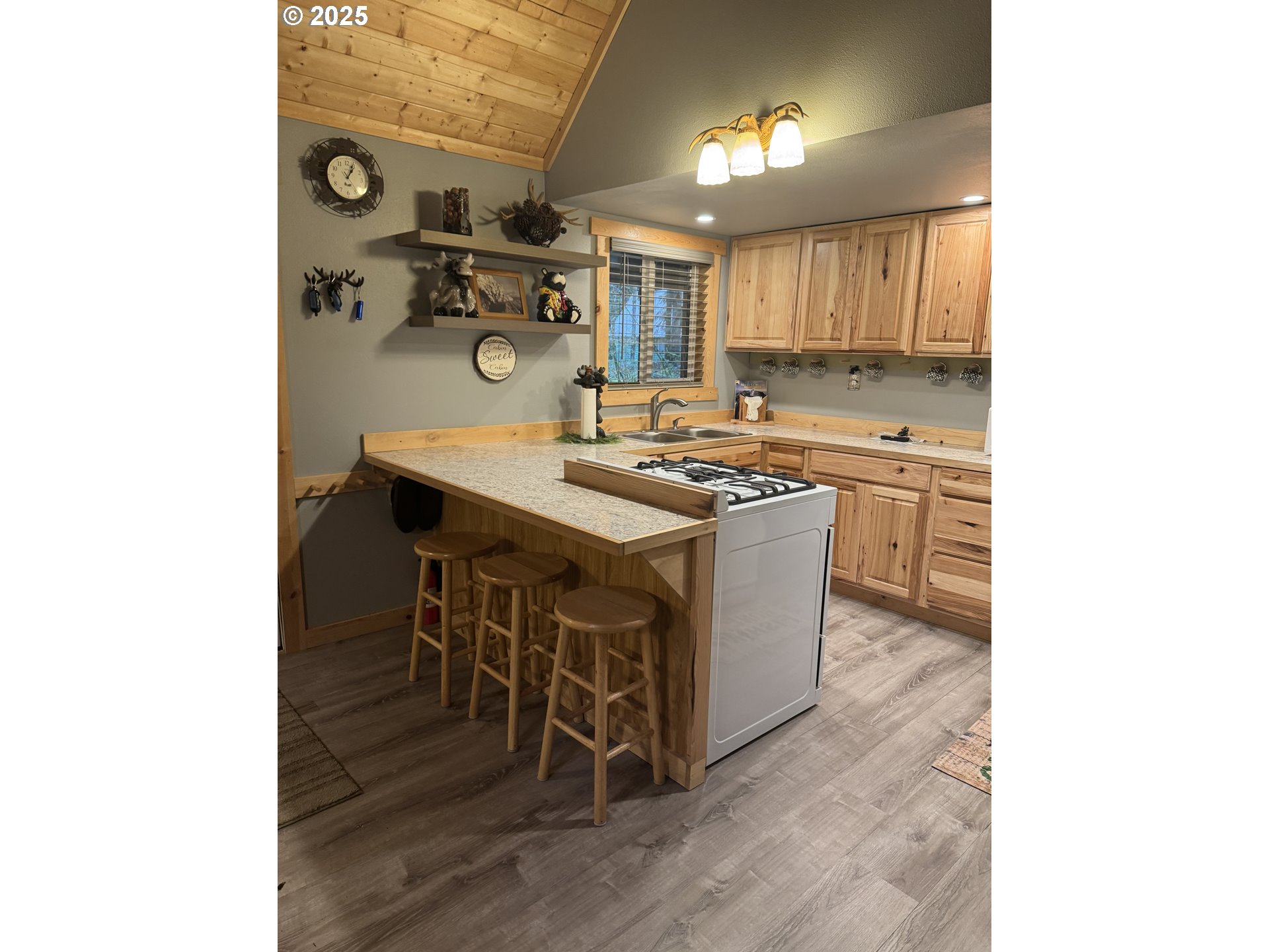 157 Northwoods Cougar, WA 98616 - Photo 21 of 27 a kitchen with stainless steel appliances granite countertop a sink stove and cabinets